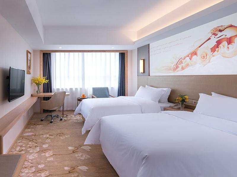 Vienna Hotel Shenzhen Pingji Ave Extérieur photo